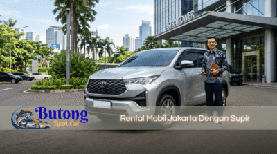 Supir Butong Rent Car berseragam batik siap melayani rental mobil Jakarta dengan supir di depan Astra Tower.