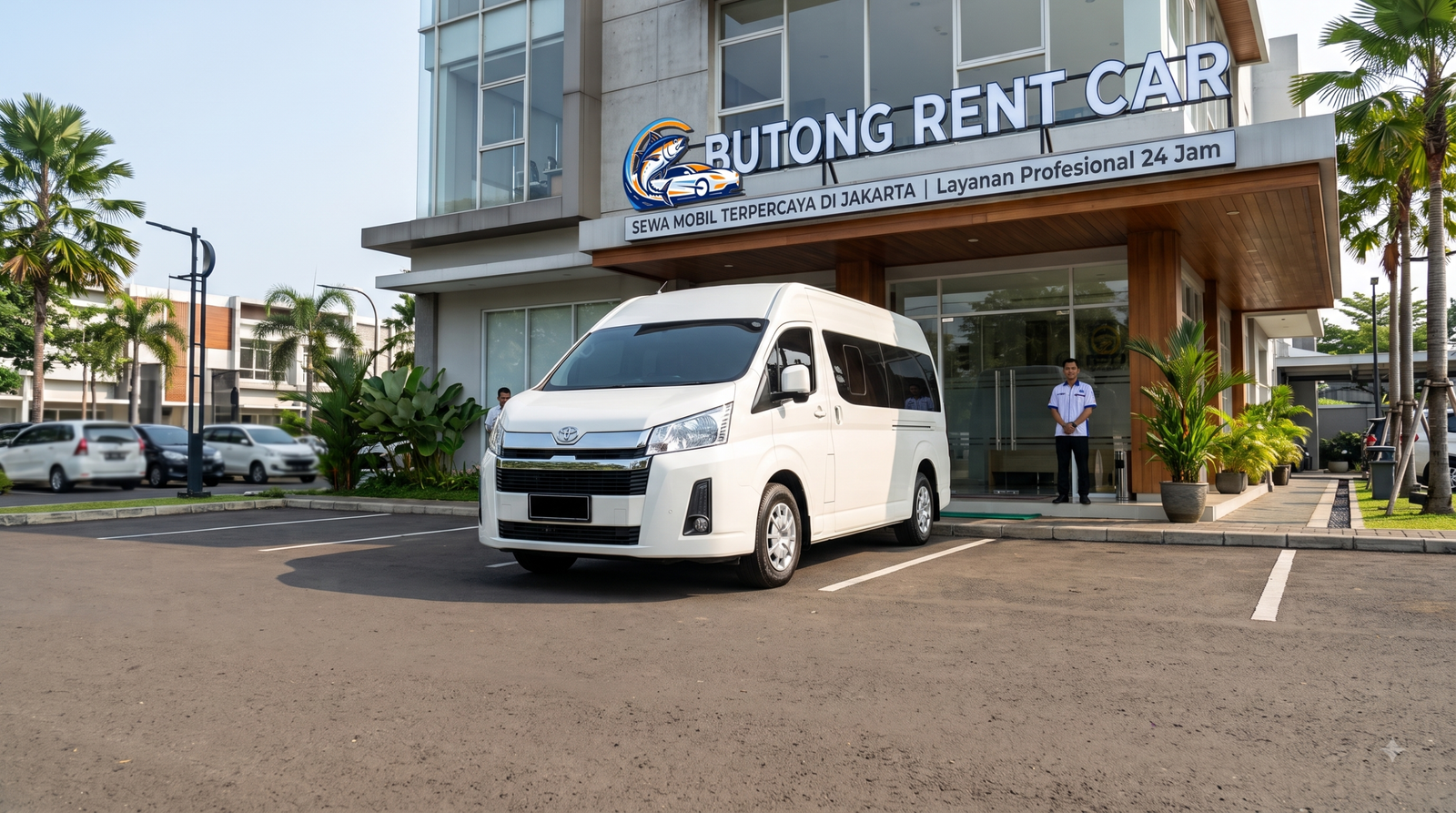 Tips memilih rental Hiace Jakarta terpercaya, mobil putih di depan kantor